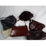 A collection of good quality lady's handbags to include a real leather, brown by A.