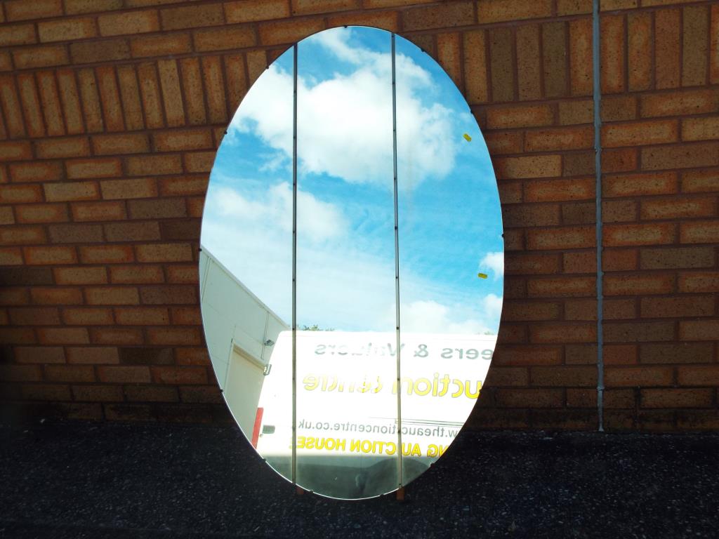 A large oval mirror 136.