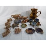 A collection of Wade ornamental pieces, to include posy vase, pin trays and Irish Wade.