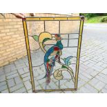 A good moderrn stained glass panel including a depiction of a pheasant,