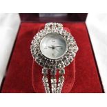 Past Times - a good quality Past Times lady's white metal wristwatch set with diamante and mother