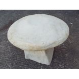 Stonework - a reconstituted stone garden ornament in the form of a mushroom