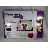 A Sklz pro mini xl basketball hoop with a customisable addition to be used in the home and outdoors,