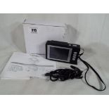 A digital 4x magnifier with 2.8" LCD screen, 36 inch USB power cable and manual, boxed.