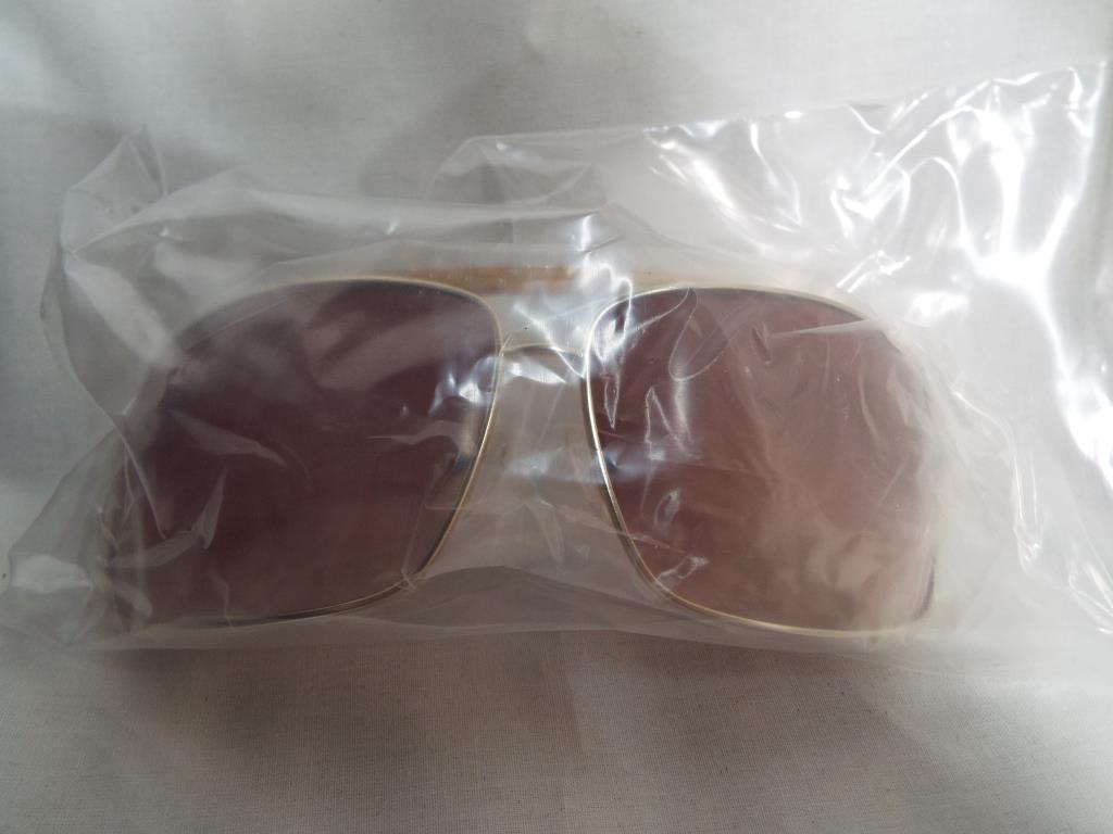 Four boxes of new and unused glasses / sunglass still in clear film bags, - Image 2 of 2