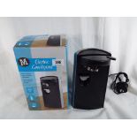 A Morrisons 60 watt electric can opener with built-in bottle opener and knife sharpener,