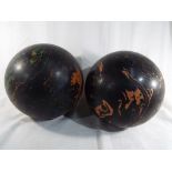 Two bowling bowls in the style of marble, one weighing 4.8 kgs, the other 6.