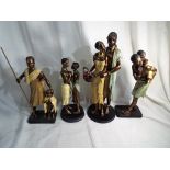 Maasai - four Maasai figurines from the Gleneagles Studio Collection,