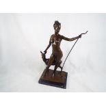 A bronze sculpture depicting Diana Goddess of Hunting, mounted on a marble base signed, 32.5 cm (h).