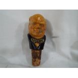 A plaster bottle stopper depicting Winston Churchill 11.