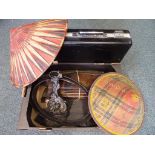 The constituent parts of a metal bound wooden barrel, a metal doorstop, two Chinese style hats,