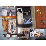 A good mixed lot to include a selection of CDs, a vintage suitcase by Foxcroft,