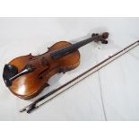 A violin, the paper label within scribed 'Imported by Leslie Sheppard, Burgess Hill, Sussex,