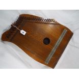 A zither with tuning key