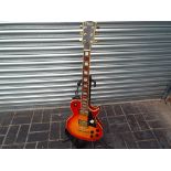 A Nevada six string guitar with sunburst body with soft case