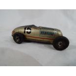 An early 20th century tin-plate clockwork toy Racing Car, weight approx 45 gm,