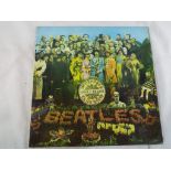 A rare The Beatles Sgt Peppers Lonely Hearts Club Band Fourth Proof 1st pressing mono 33.