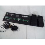 A LINE Floor Board dedicated remote control pedal for the AXSYS 212 digital guitar system with