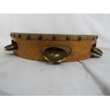 A wooden tambourine