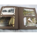 Deltiology - a postcard album containing early-mid period UK views,
