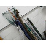 Angling - a good mixed lot to include two fishing umbrellas, a landing net, rod rests,