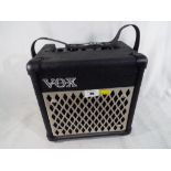 A Vox DA5 digital guitar amplifier,