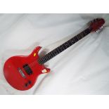 A six string solid guitar by Encore