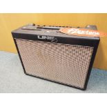 A Flextone 60 watt amplifier, model LINE6,