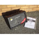 A Roland Cube Street, battery powered stereo amplifier,