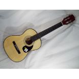 A beginner's good acoustic guitar,