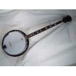 A Westfield resonator five string tenor Banjo with Remo Weatherking head,