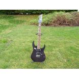 An Ibanez RG T42DX FM 6-string electric guitar with hard case - Est £100 - £150