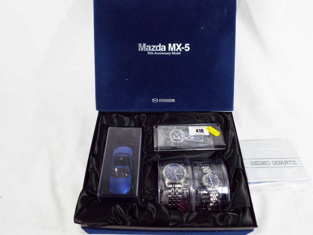 A Mazda MX-5 10th anniversary gift set comprising His and Hers Seiko MX-5  watches with instructio