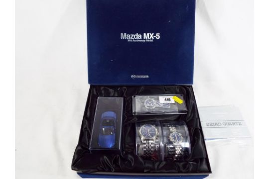 A Mazda MX-5 10th anniversary gift set comprising His and Hers Seiko MX-5  watches with instructio