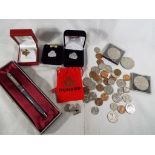 A good mixed lot to include a small quantity of coins,