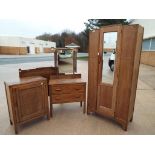 A limed oak bedroom suite comprising wardrobe 187 cm x 87 cm x 43 cm, headboard and footboard,