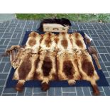 A car blanket made from polecat skin,107 cm x 140 cm taken from a car owned by Charles Ravenscroft,