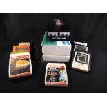 Two stereo 8 track players (boxed and unused) and eight 8 track cassettes to include The Beach Boys,