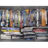 A collection of music CDs and approximately 65 film DVDs