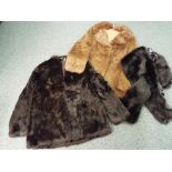 Two lady's fur coats,