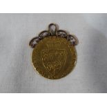 A George III gold Guinea ca 1793 with later gold mount - £200 - £250