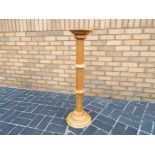 A pine fluted plant stand,