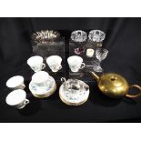 A good mixed lot to include a carved ivory napkin ring (not for export), a brass teapot,