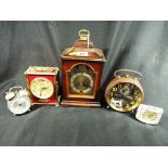 A collection of five small clocks to include bell-topped bracket style timepiece by SMiths