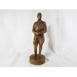 A bronzed figural sculpture depicting Adolf Hitler,