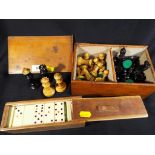 Chess - a complete set of early 20th century Staunton pattern chess pieces having green felted