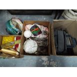 A mixed lot to include vintage sewing equipment, bag of fabric, brass cribbage board,