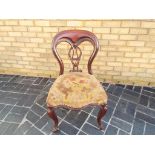 A good quality mahogany balloon back chair with upholstered seat