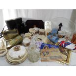 Two shelves containing a large quantity of Royal commemorative items to include plates, cups,