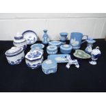 A large quantity Wedgwood Jasperware decorated in the powder blue pattern,